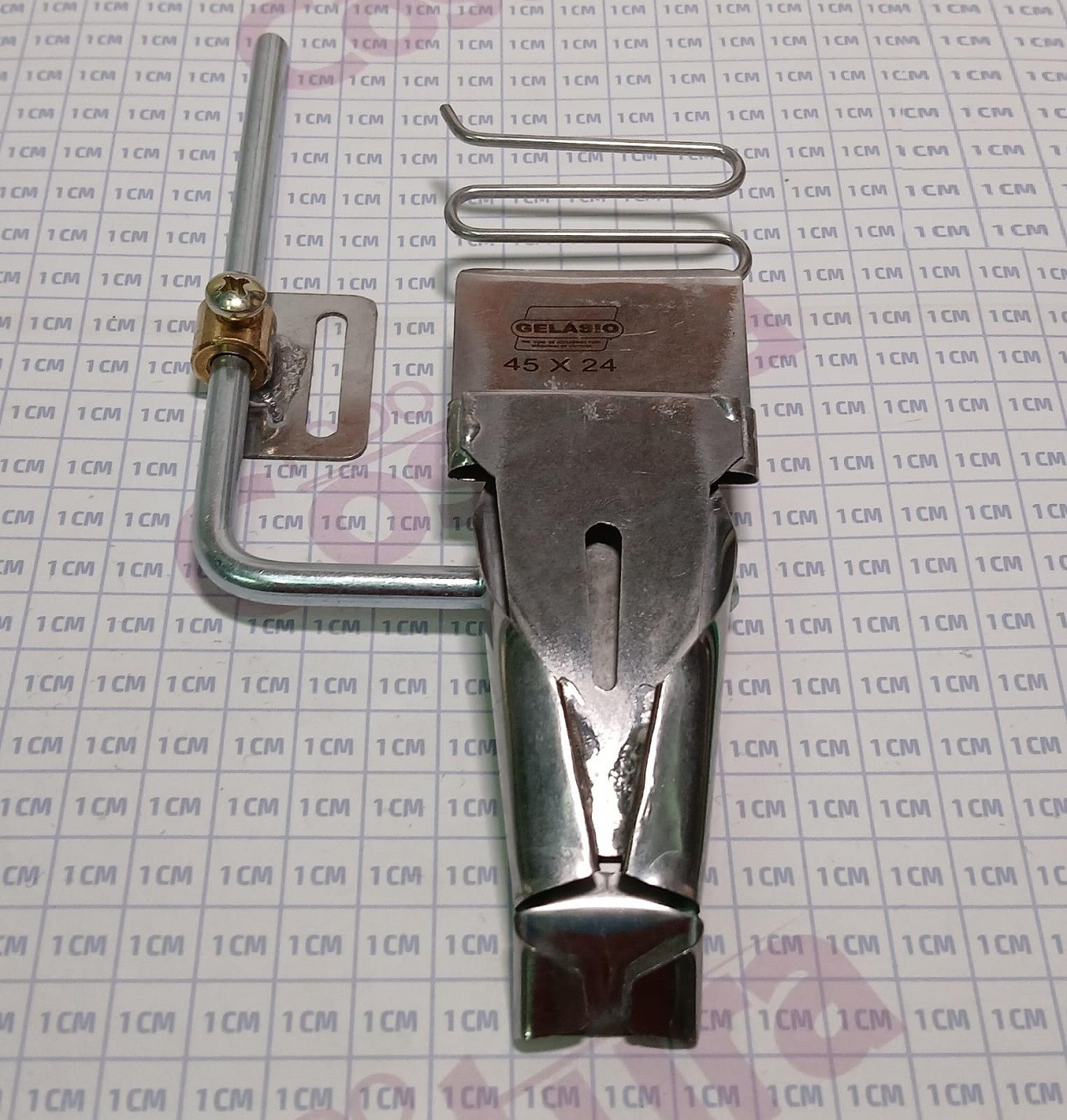 DOBLADILLADOR ADIDAS ANCHO (45X24MM) (CON SOPORTE) PARA MAQUINA ENGOMADORA