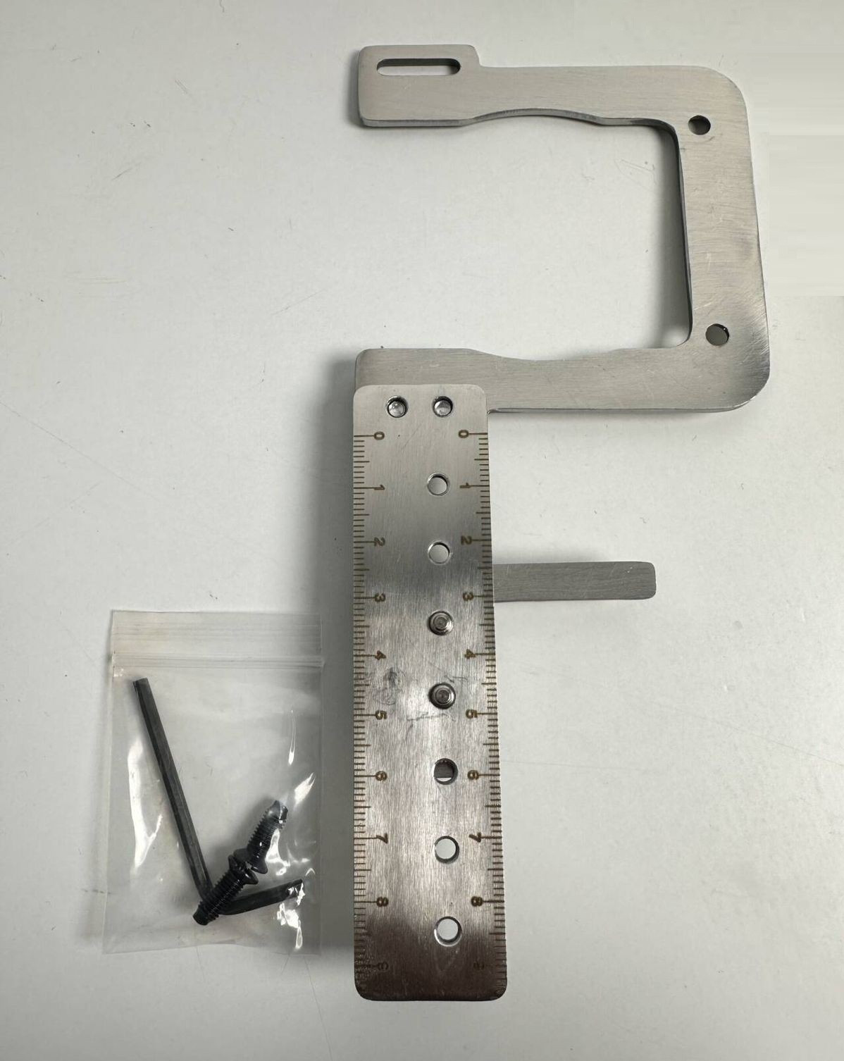 GUIA REGLA MEDIDOR DE BOTON P/ BOTNERA JUKI MB-373